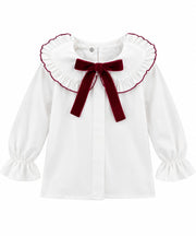 Blouse blanche pour bébé et fille avec nœud rouge