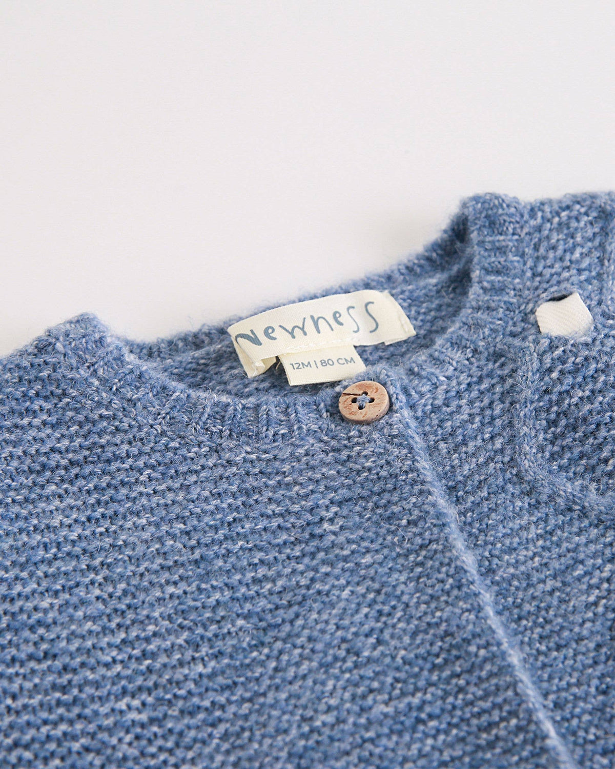 Newness Baby cardigan en maille à boutons et nœud