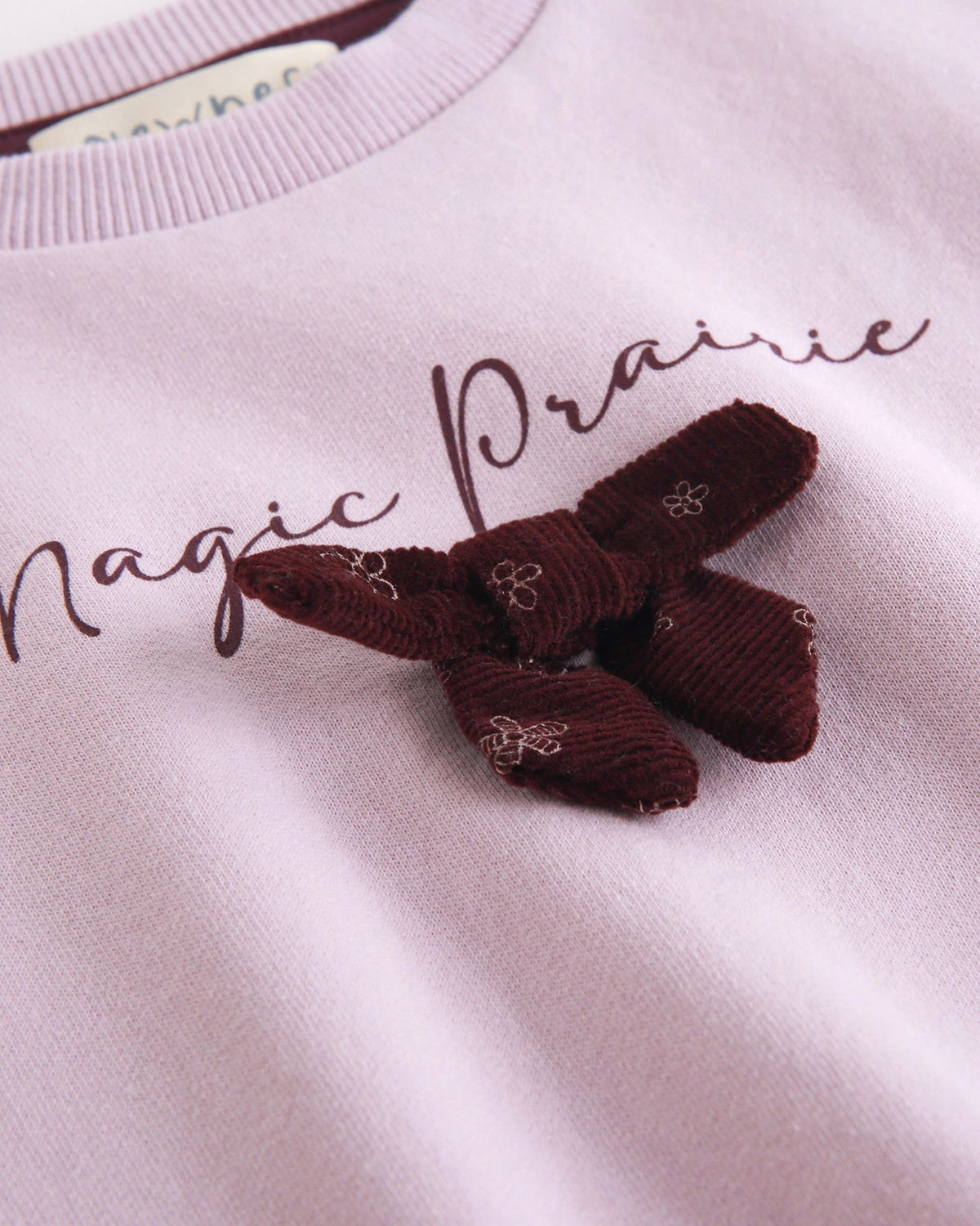 Sweat-shirt doublé polaire, texte et nœud violet