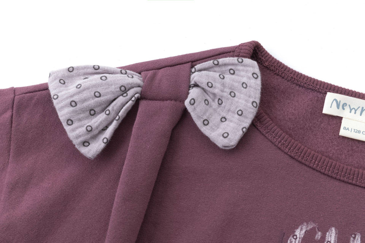 Newness Pull en polaire pour fille avec texte et nœud