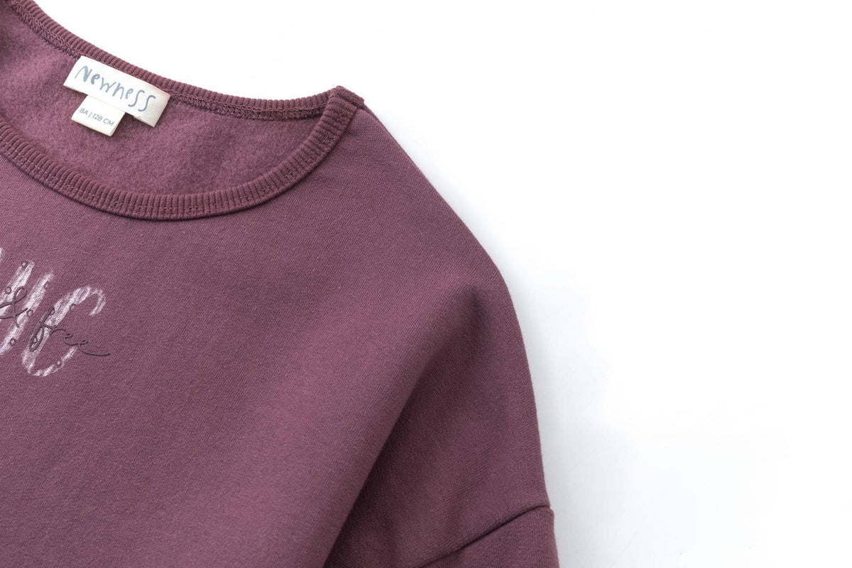 Newness Pull en polaire pour fille avec texte et nœud